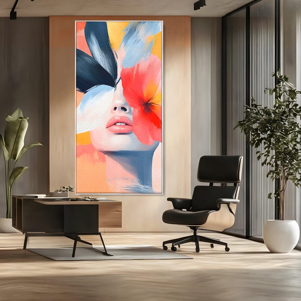 Tablou canvas cu tablou canvas cu fata de femeie si flori pictate, in rama de aluminiu argintiu, pe perete intr-un birou